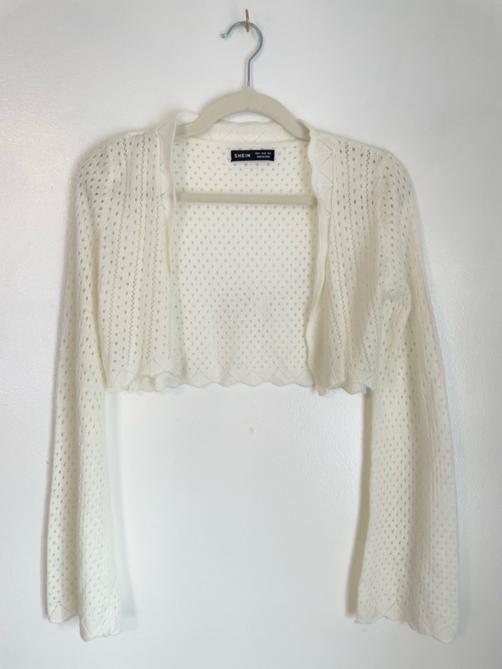 White cropped bell sleeve cardigan with hole details size small boho style small
